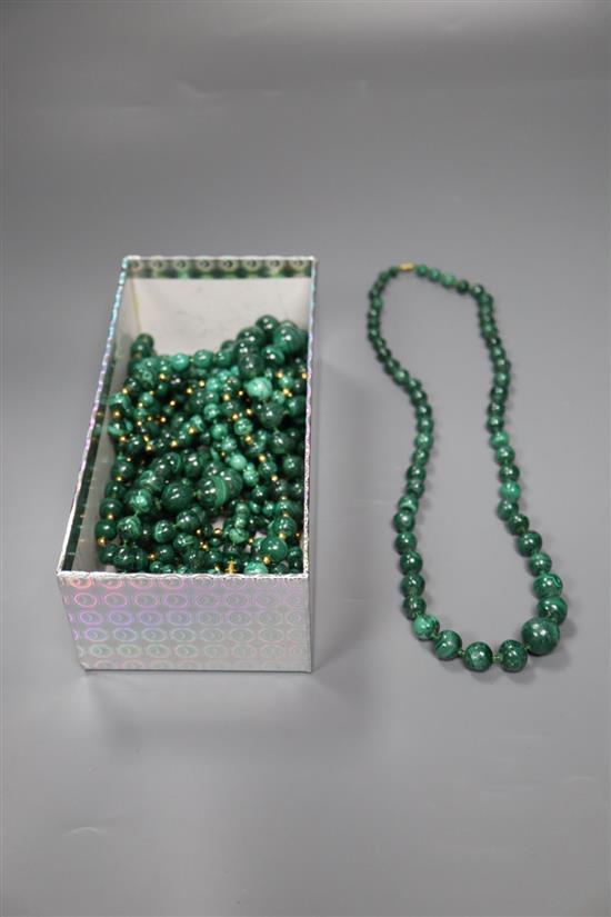 Ten assorted malachite bead necklaces, three with gilt metal spacers, largest 58cm.